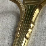 Pair of wall candle holders in bronze