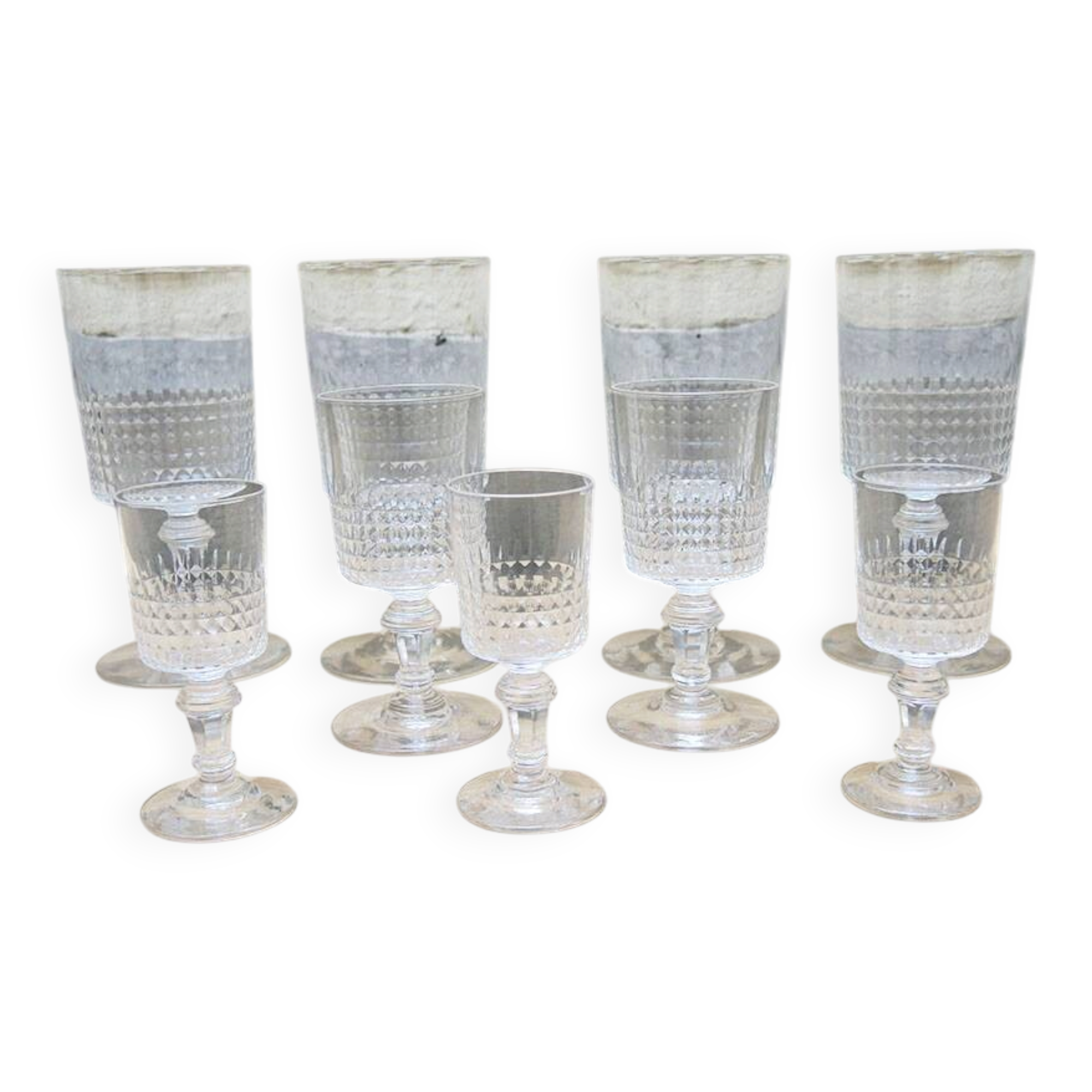Set of 9 antique stemmed glasses in Baccarat style.