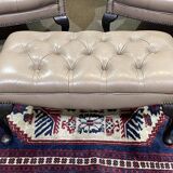 Pair of high-backed Chesterfield armchairs with 1 leather footrest