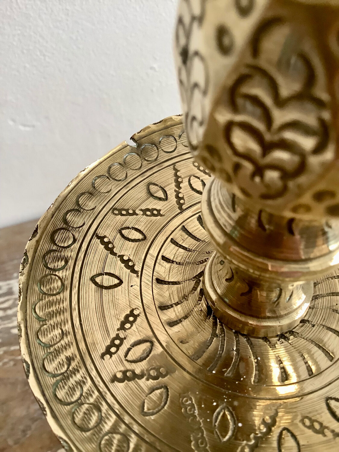 Pair of engraved brass candle holders