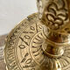 Pair of engraved brass candle holders
