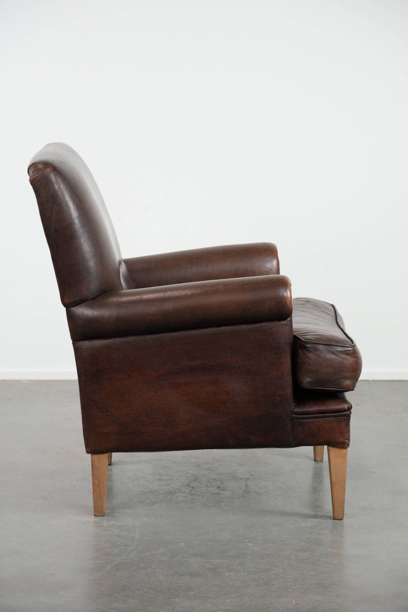 Beautiful Characterful Sheep Leather Armchair with a Deep Colour