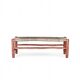 Wooden bench and woven rope