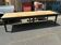 Black dining table in fir.