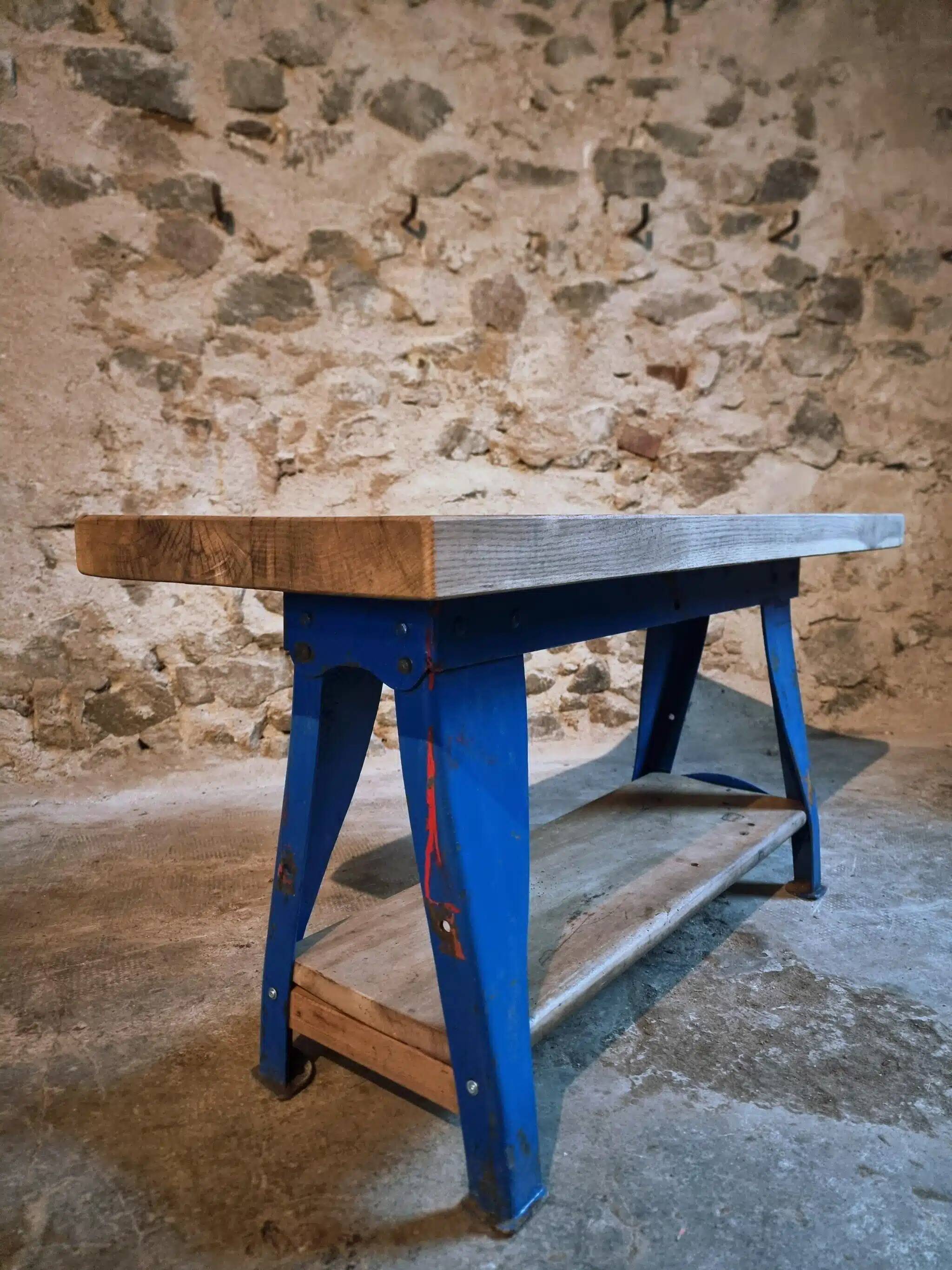 Vintage industrial workbench table with cast iron legs (Aux Forges de Vulcain)
