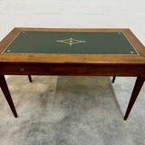Louis XVI desk with green leather and shelves.