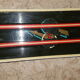 Old skis wooden and its pair of sticks