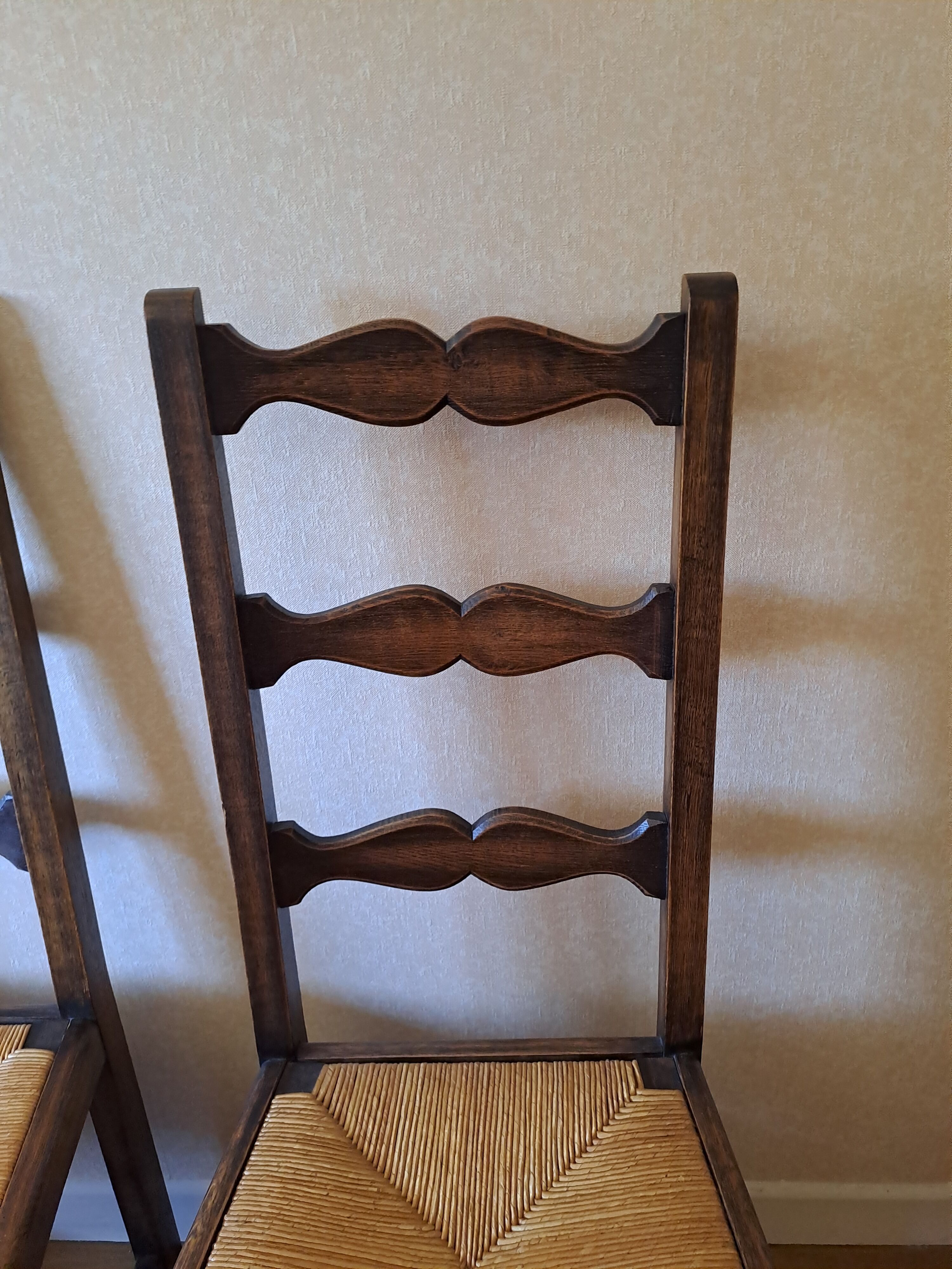 6 wooden and straw chairs