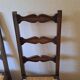 6 wooden and straw chairs