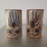 Two vases rolls decorated with thistles, signed