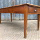Antique cherry farmhouse table with 2 drawers and 1 pull-out