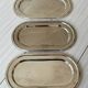 Set of 3 silver-plated trays with a very patinated finish.