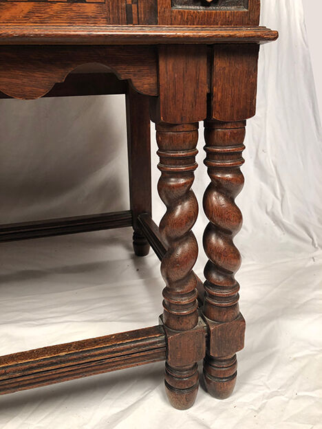 English Renaissance style oak cabinet