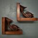 Pair of hand-carved art-deco fish bookends - 30s