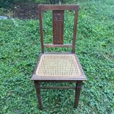 Pair of wooden and cane chairs