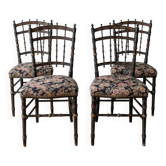 Set of 4 Napoleon chairs in blackened wood and floral fabric.