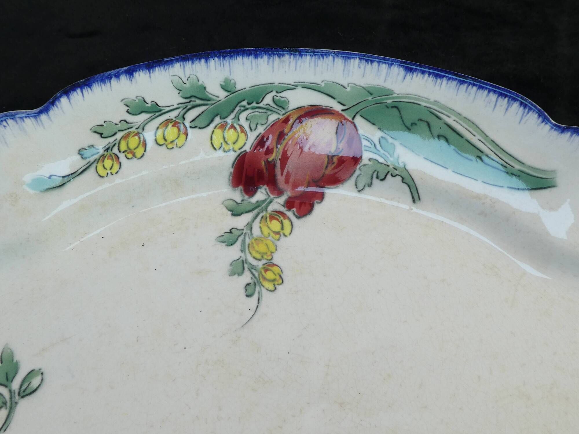 Emile BOURGEOIS PARIS Oval dish in faience floral motif