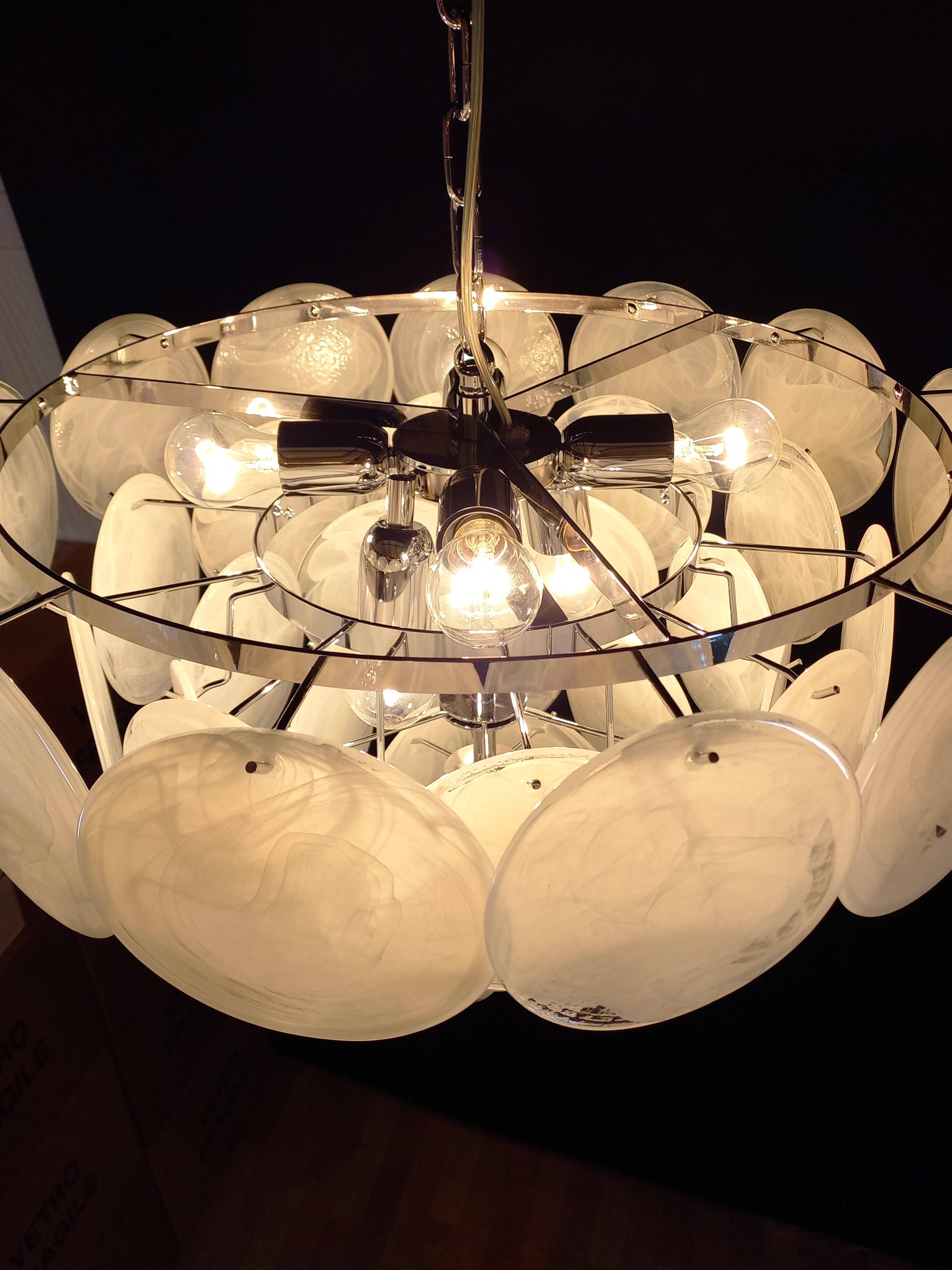 Handcrafted chandelier with Murano glass and handmade alabaster discs.