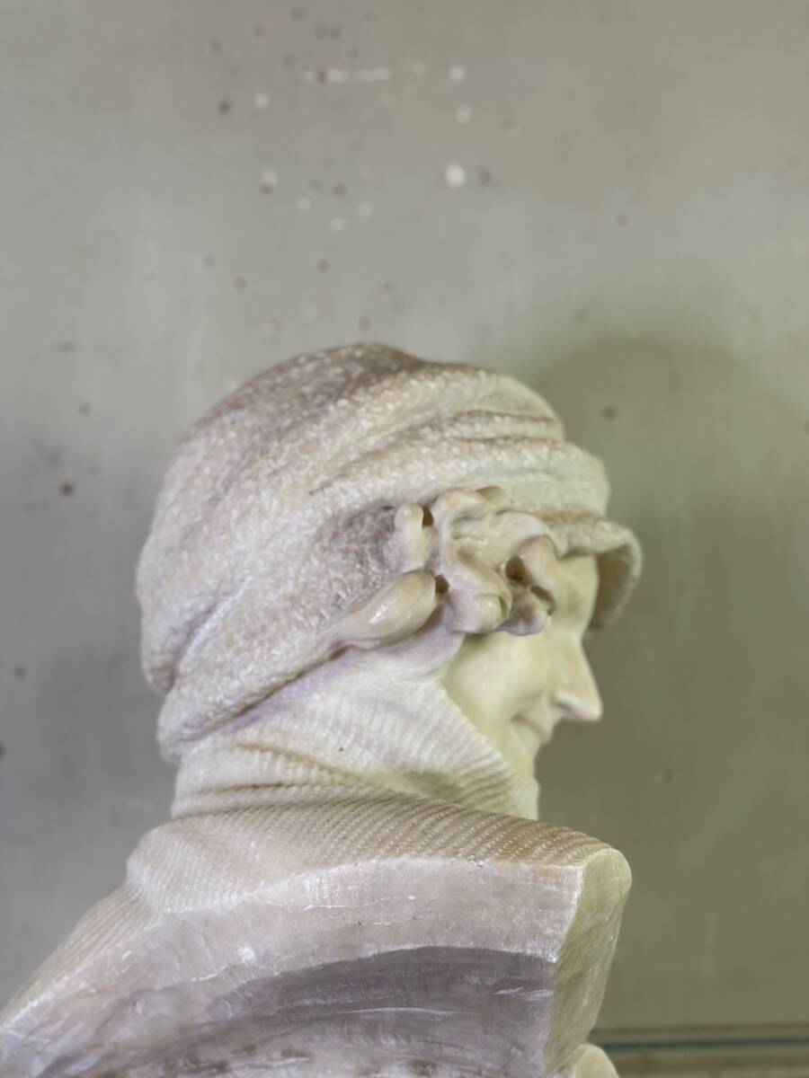 Alabaster bust of a young girl with a turtleneck, signed Caloni, Italy circa 1900