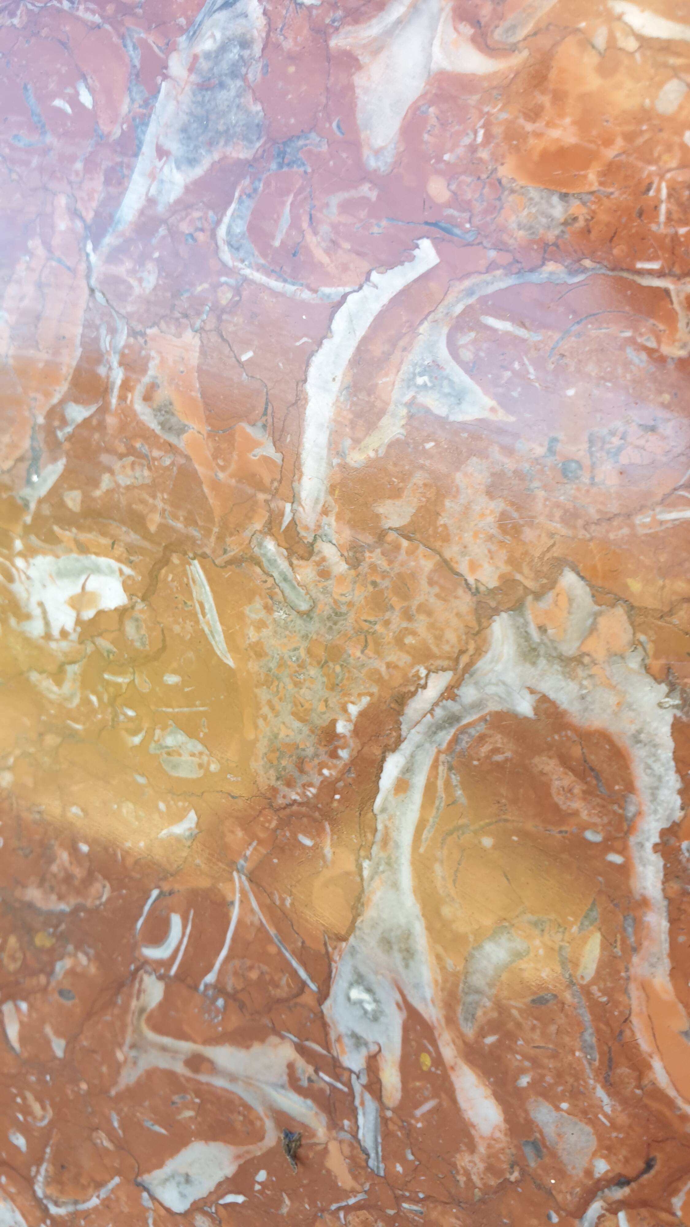 Red marble fireplace surround - early 20th century