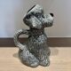 Old ceramic poodle jug