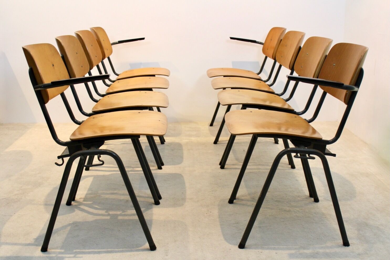 School bench consisting of 4 stackable chairs in industrial plywood by Marko Holland