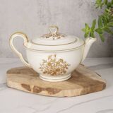 Porcelain tea service by Théodore Haviland, gilded patterns.