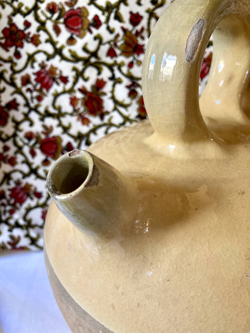 Yellow glazed terracotta gargoulette