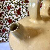 Yellow glazed terracotta gargoulette