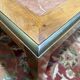 Contemporary coffee table in mahogany and marble.