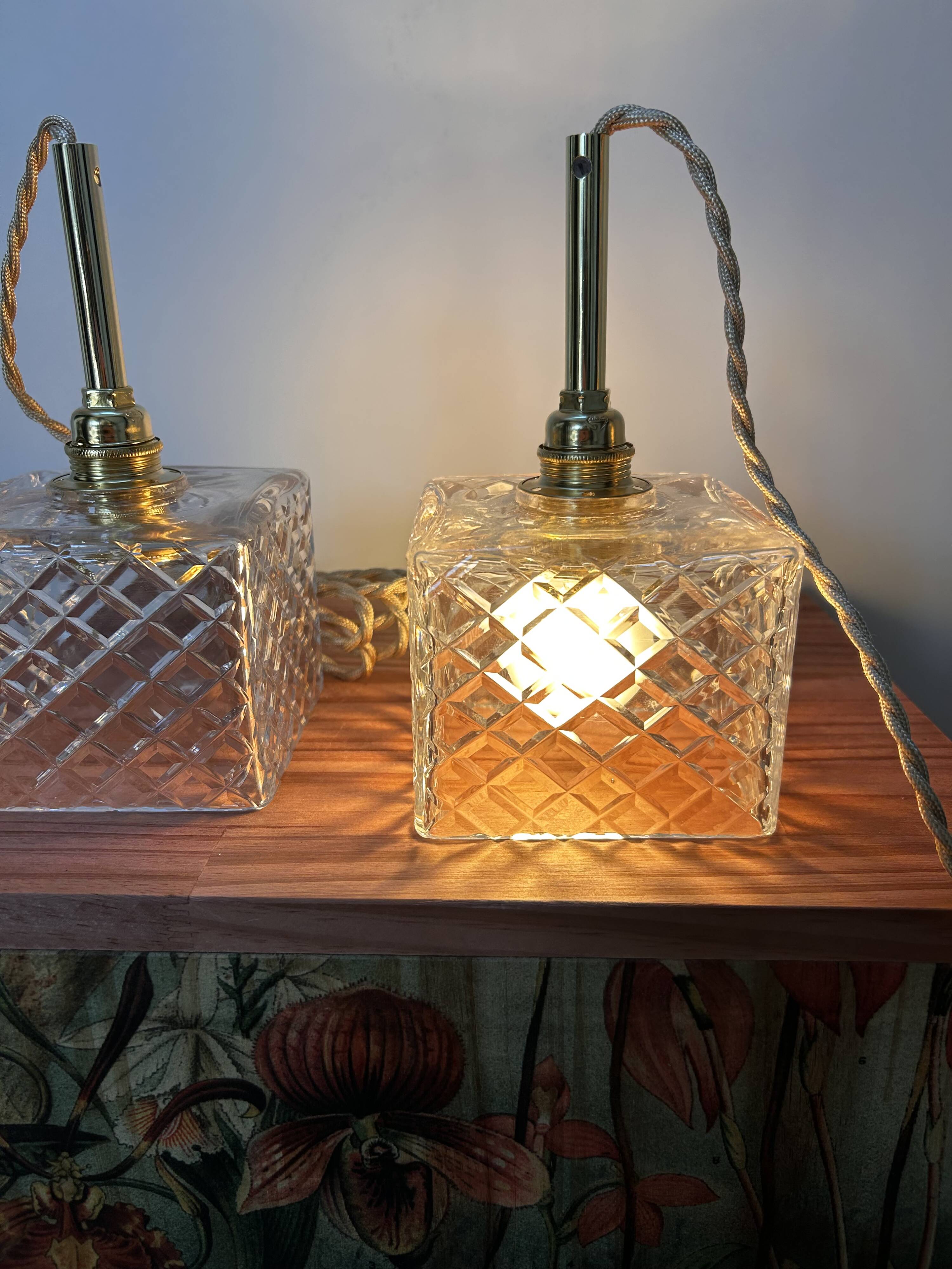 Pair of chiseled glass portable lamps