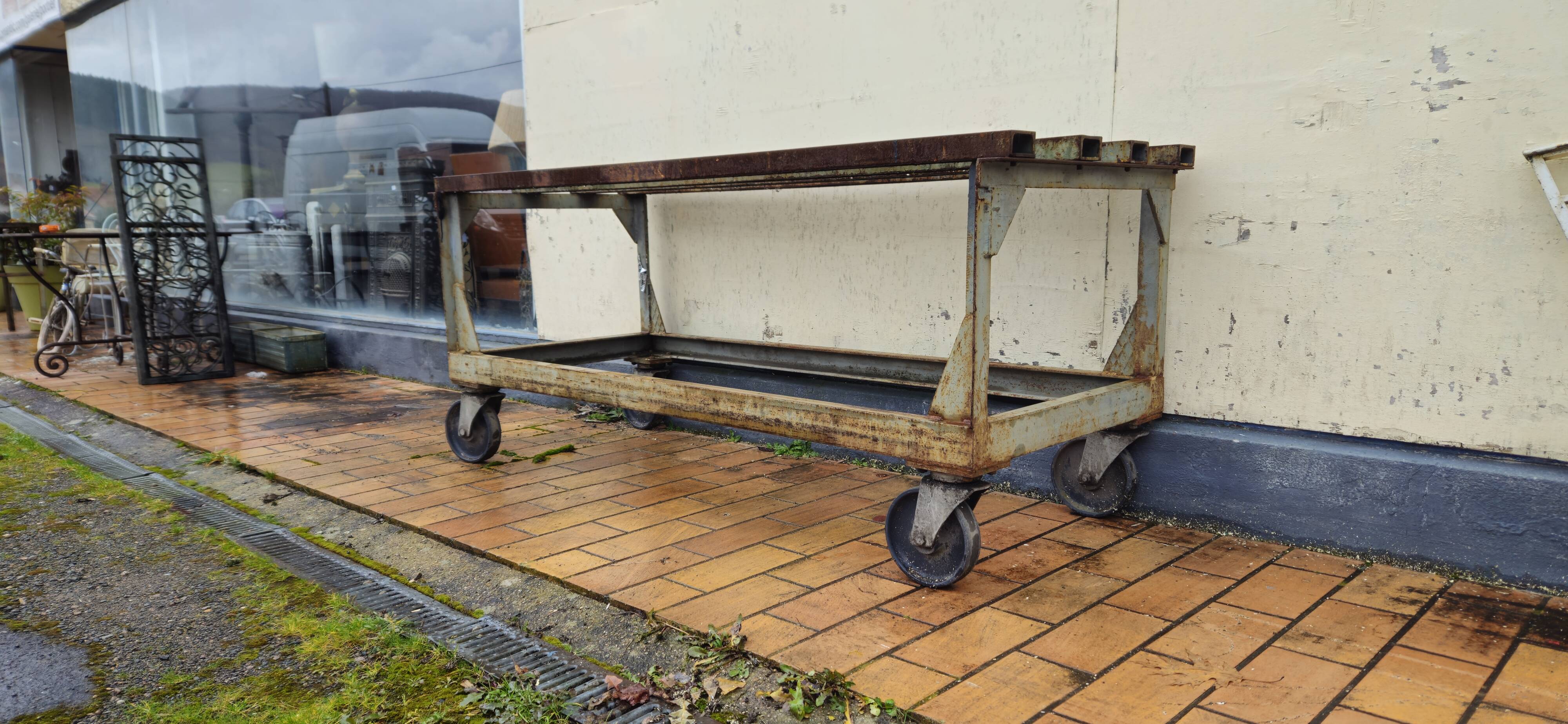 Metal industrial table on wheels, mid-20th century