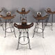 Ensemble de 6 tabourets de bar brutalistes, en fer forgé, années 1960.