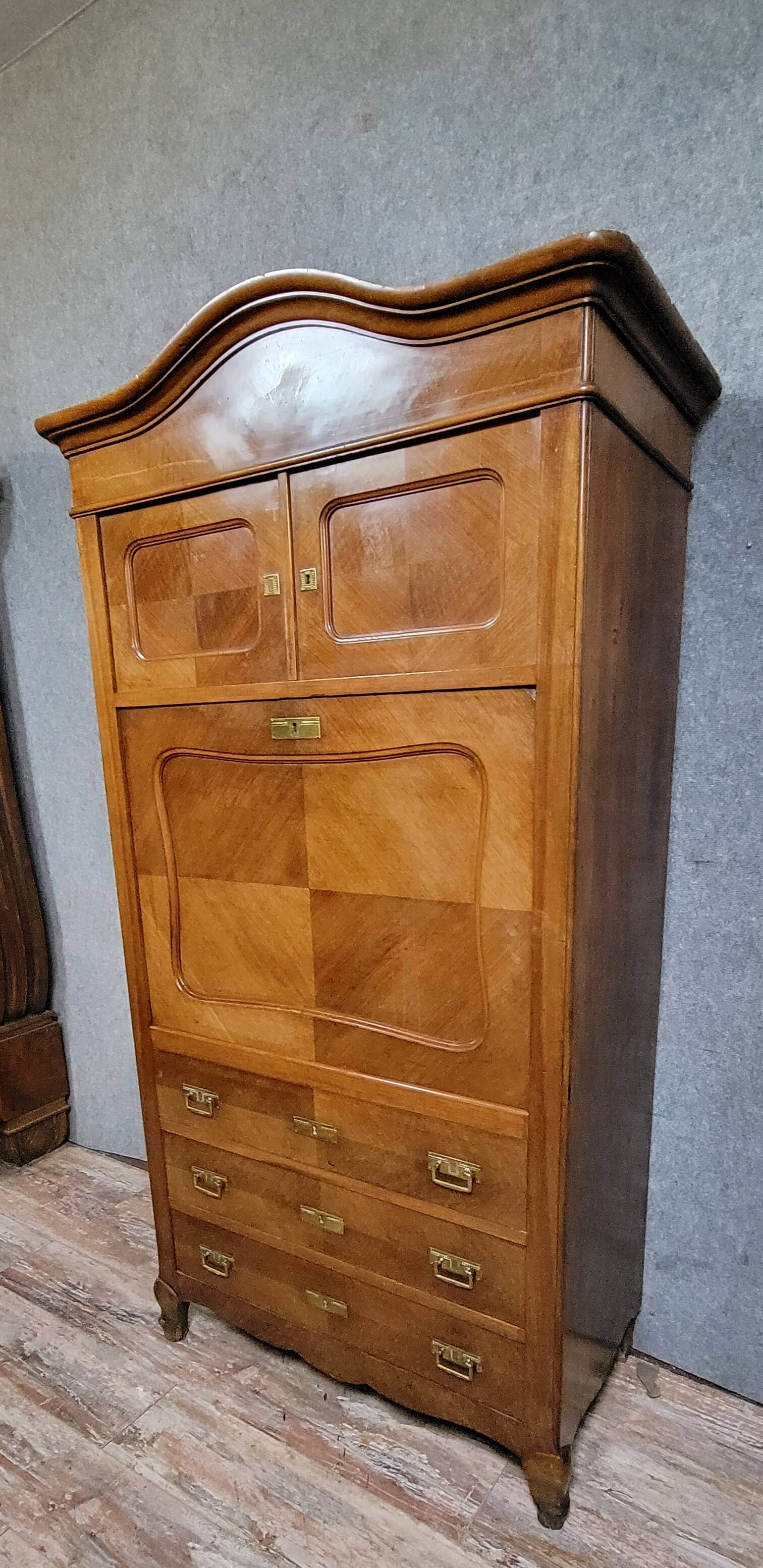 Rare Biedermeier guillotine secretary, made of walnut and marquetry.