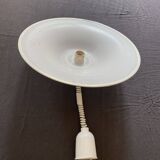 Suspension of the 80s in perforated white metal