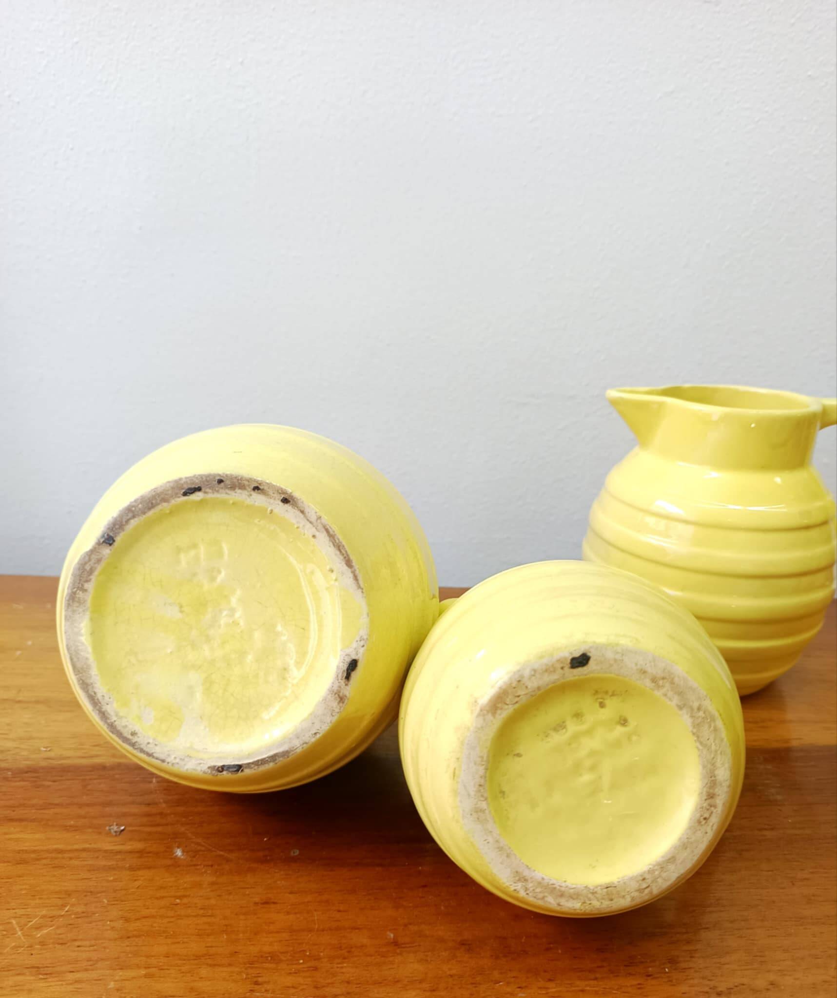 3 Orchies art deco pitchers in yellow ceramic