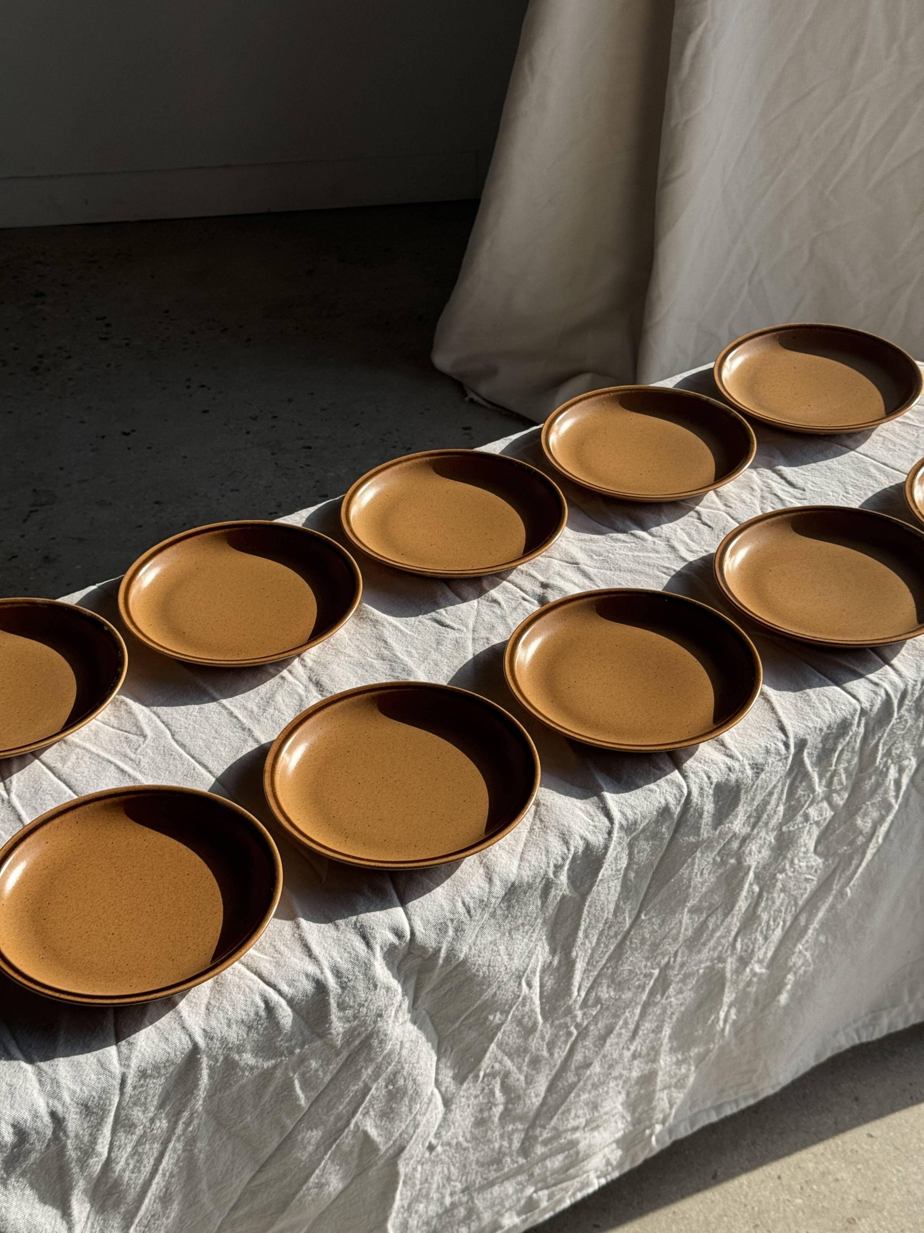 Set of 11 small dessert plates in brown-striped stoneware from Sarreguemines.
