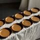 11 assiettes à dessert en grès liseré brun Sarreguemines