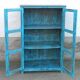 Glass cabinet in old blue wood