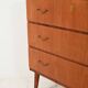 Scandinavian teak and mahogany chest with brass accents
