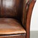 Ensemble de deux fauteuils en peau de mouton / fauteuils tubulaires avec une belle patine.