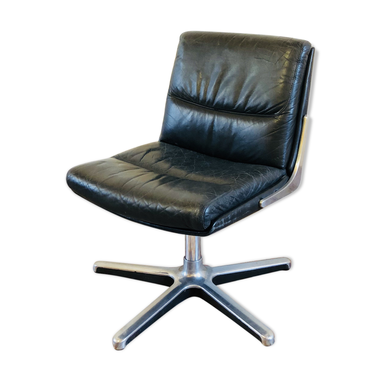 Armchair in leather and chrome Drabert