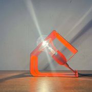 Orange metal table lamp, minimalist, modern mid-century space age, 1960s.