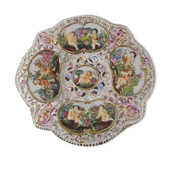 Capedimonté openwork plate, 4 seasons putto