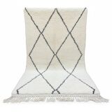 Moroccan Berber rug with black diamond patterns