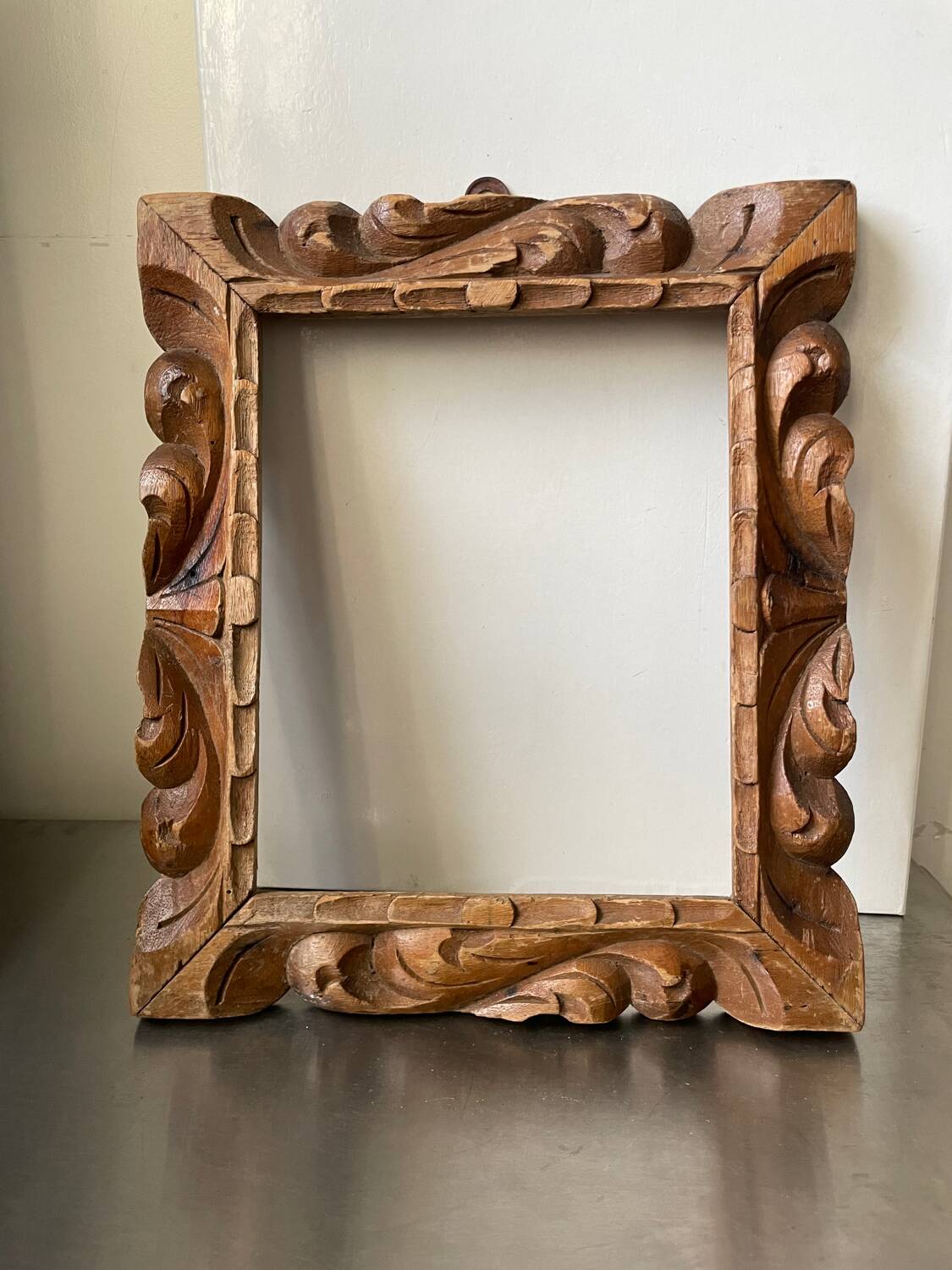 Antique handcarved frame   solid wood 33.5  x 29 cm  opening measurements 23.5 cm x 19 cm cedar wood