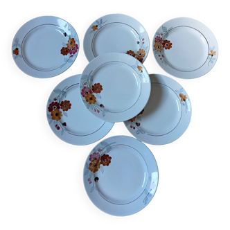 7 flowered dessert plates, St Amand factory, 1930