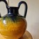 Pottery, jar, old jug in yellow and green glazed terracotta