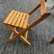 Children's folding chair made of wood.