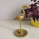 Naif brass bird